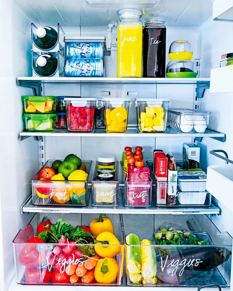 Beautiful, clean and organized fridge with wood and glass storage