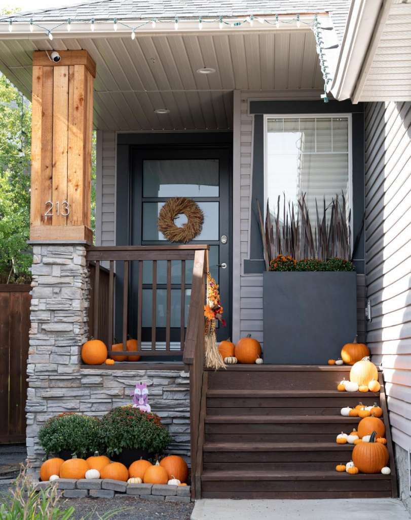 lux windows and doors, west coast modern door, glass front door, glass panel door, front door decor, decorate your porch for fall, fall front door, fall front entrance decor, fall front porch pumpkins, fall mums front door, front porch pumpkins mums, natural fall wreath, wheat wreath, fall pumpkins, Pinteresty fall front doors, pinteresty front porch fall, autumn front door decor