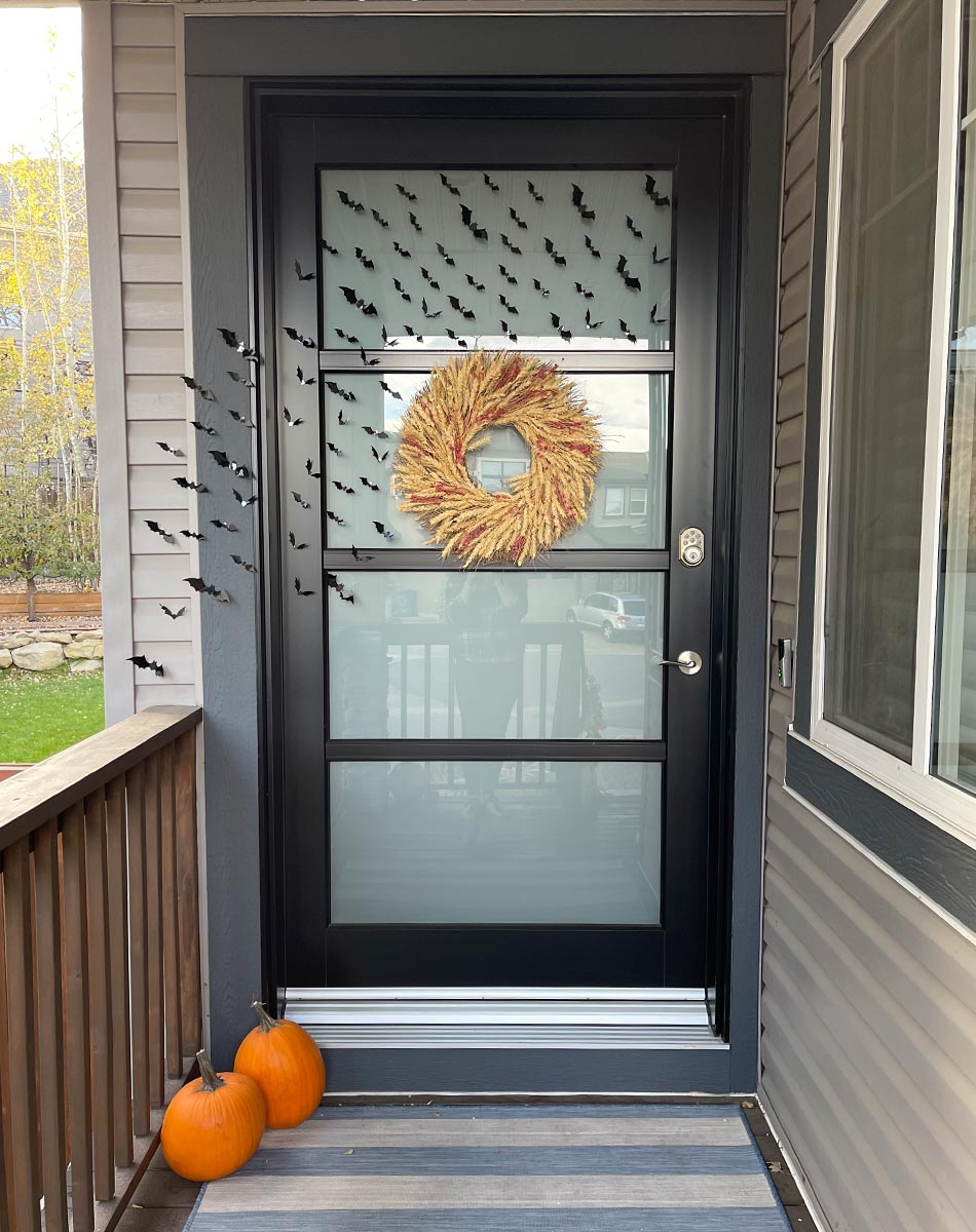 fall door decor, halloween decor, outdoor halloween decor, halloween porch inspo, halloween door inspo, outdoor halloween decor inspo, decorate for halloween, lux windows and doors, cute halloween decor, halloween decor for kids, swarm of bats halloween decor, how to do a swarm of bats