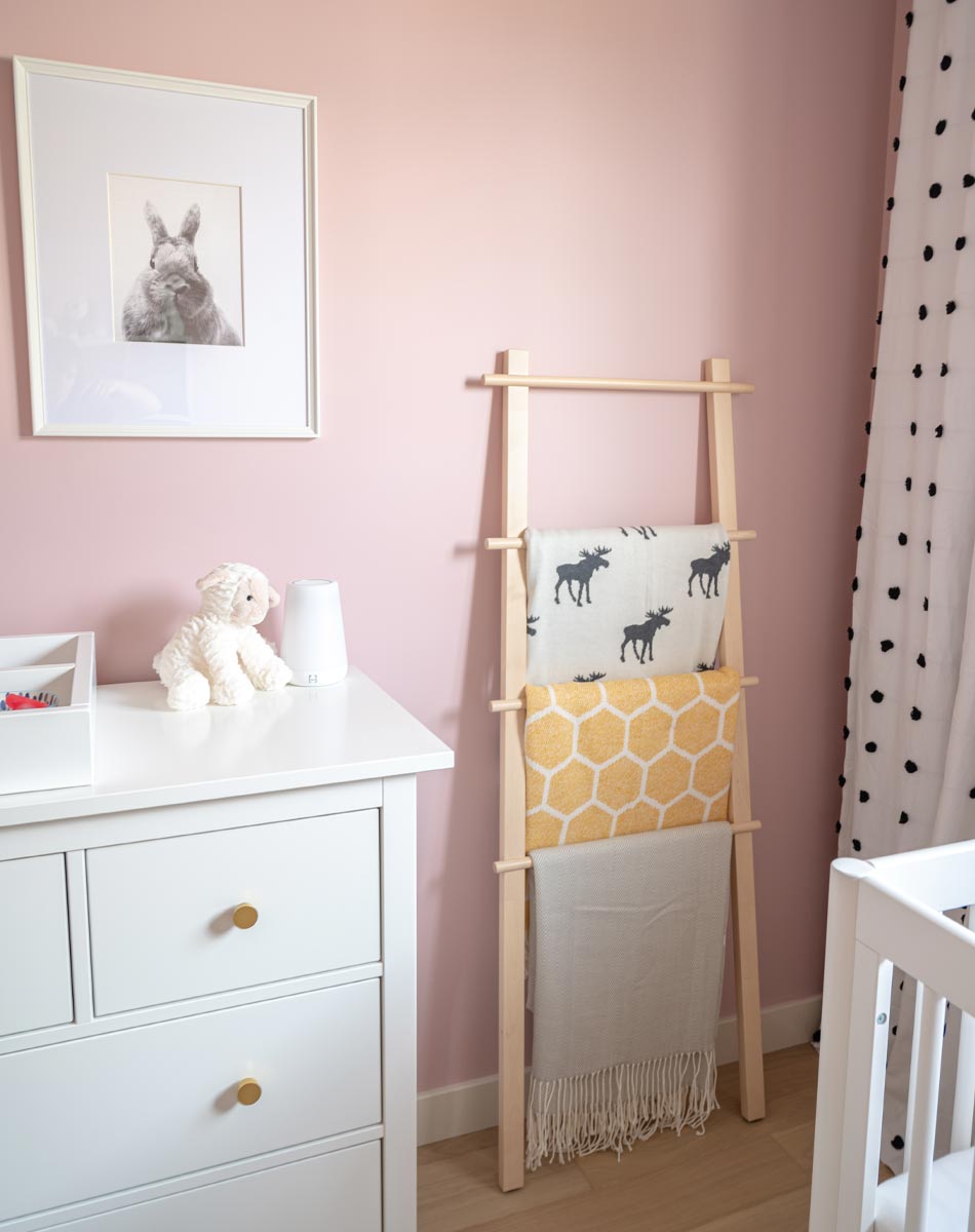 pink nursery, feminine nursery, baby girl room, baby girl nursery, white crib, white crib pink walls, pink walls nursery, modern feminine nursery, modern girls room, modern baby girl room, pompom curtains nursery, IKEA PAX Wardrobe hack, IKEA PAX Wardrobe nursery closet, blanket ladder in nursery